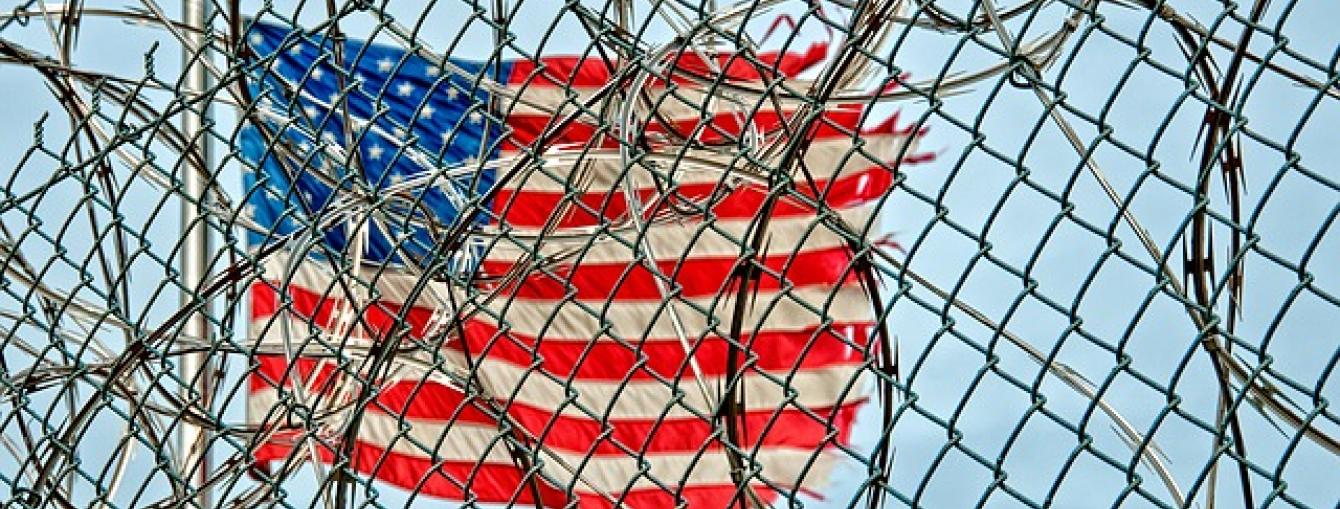 American flag and barbed wire