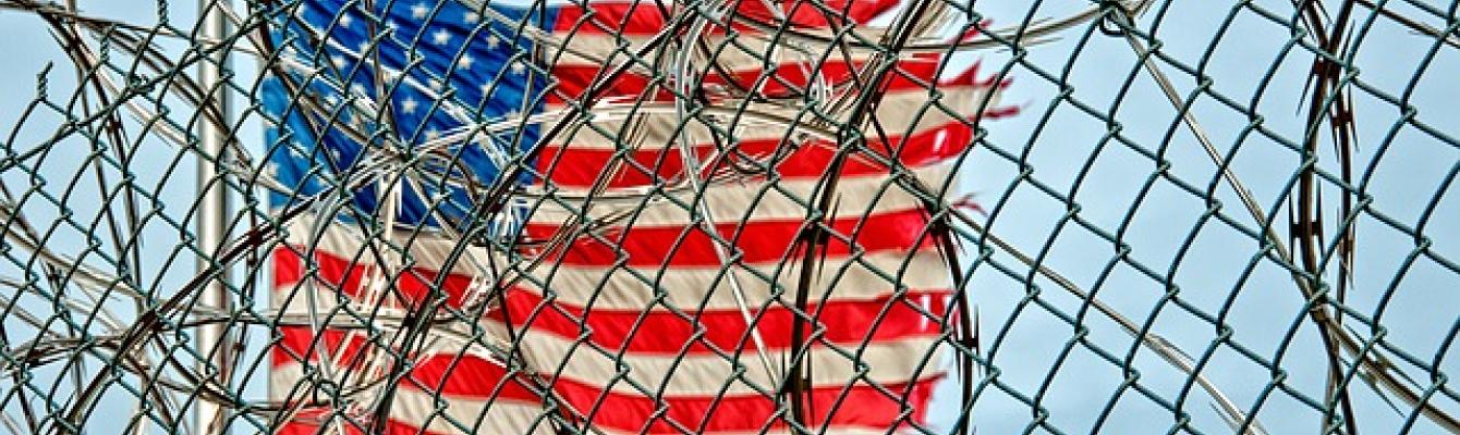 American flag and barbed wire