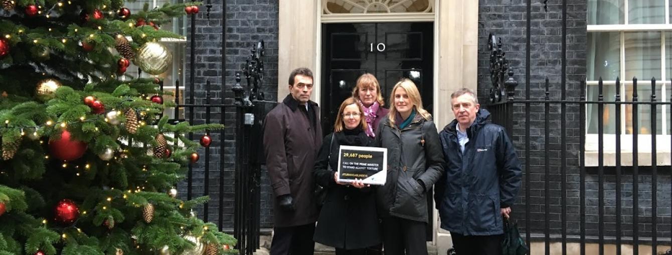 Freedom from Torture outside No. 10 Downing Street, handing in a petition calling on Prime Minister Theresa May to reaffirm the UK’s commitment to the ban on torture