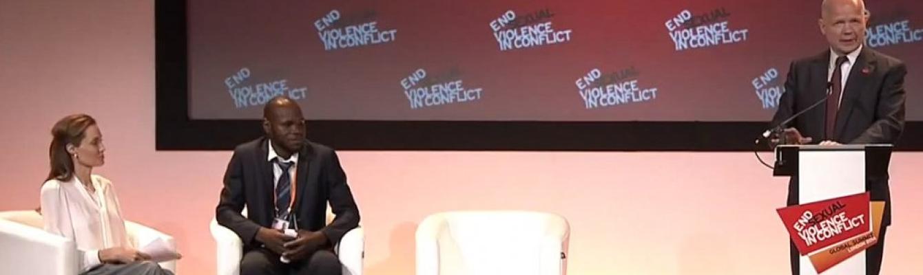 William Hague speaking with Angelina Jolie (left) and Kolbassia Haoussou (right)