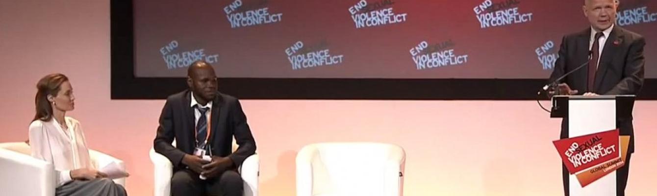 William Hague speaking with Angelina Jolie (left) and Kolbassia Haoussou (right)