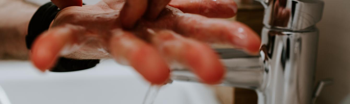 Man washing his hands