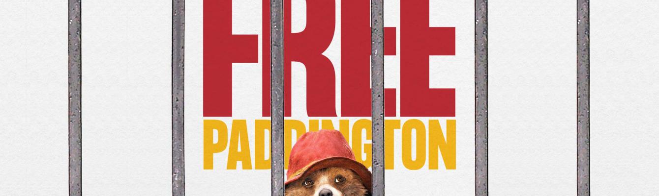 Paddington Bear behind bars graphic with the words FREE PADDINGTON behind.