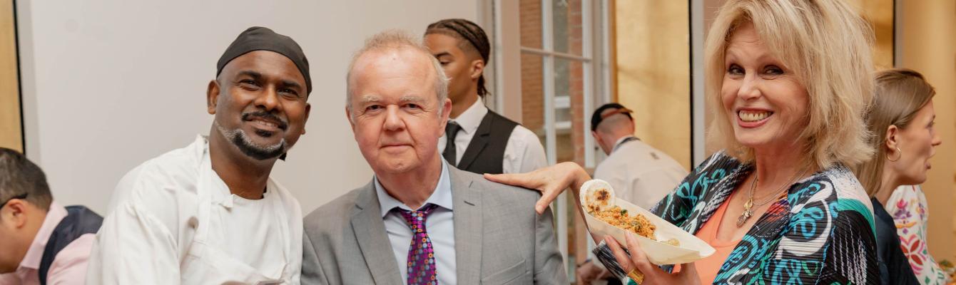 Joanna Lumley and Ian Hislop with Yogi, a torture survivor