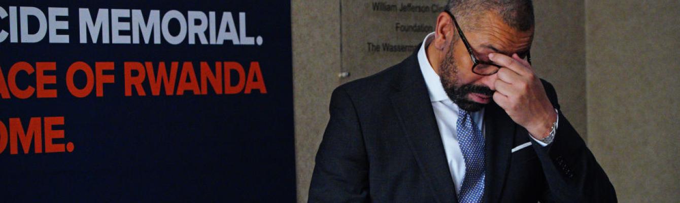 James Cleverly with his head in his hands