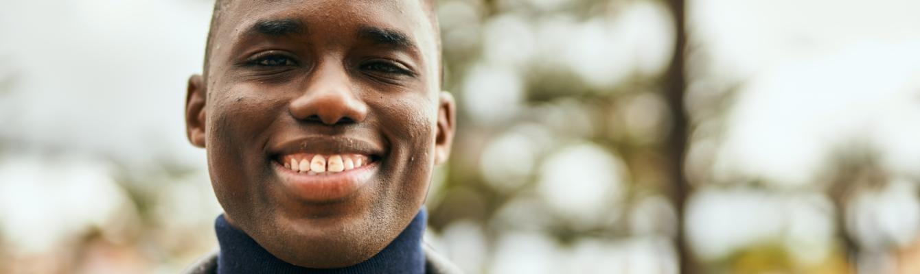 Young man smiling at camera