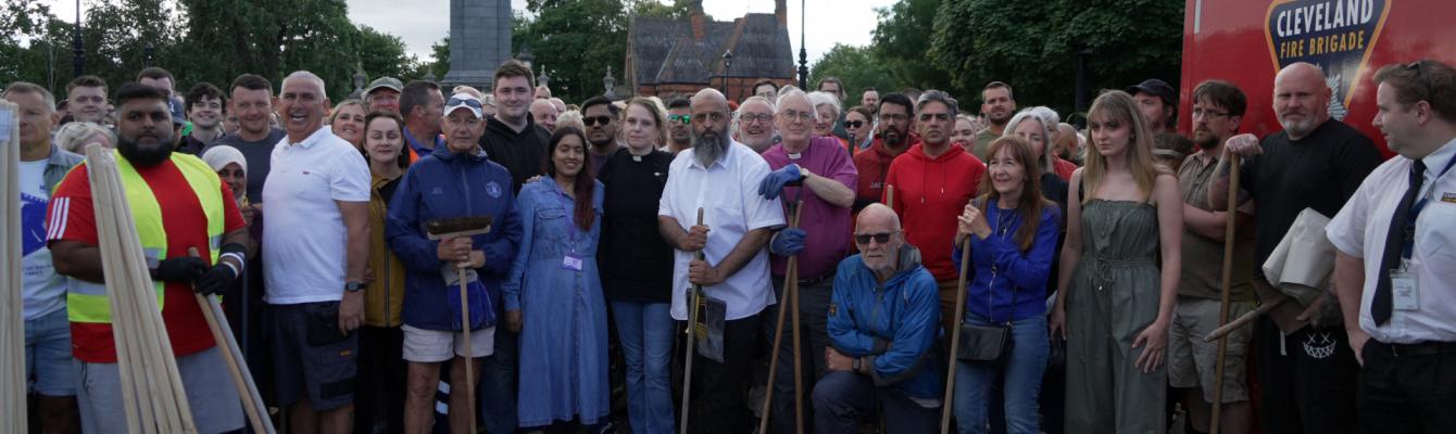 Multiple people stand in solidarity in Middlesborough