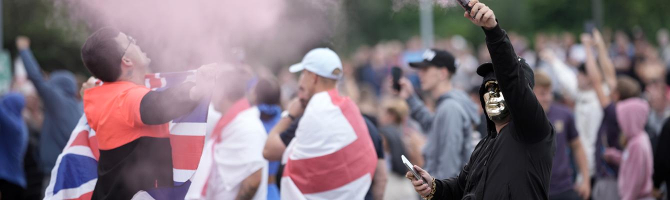 Rioters with a flare