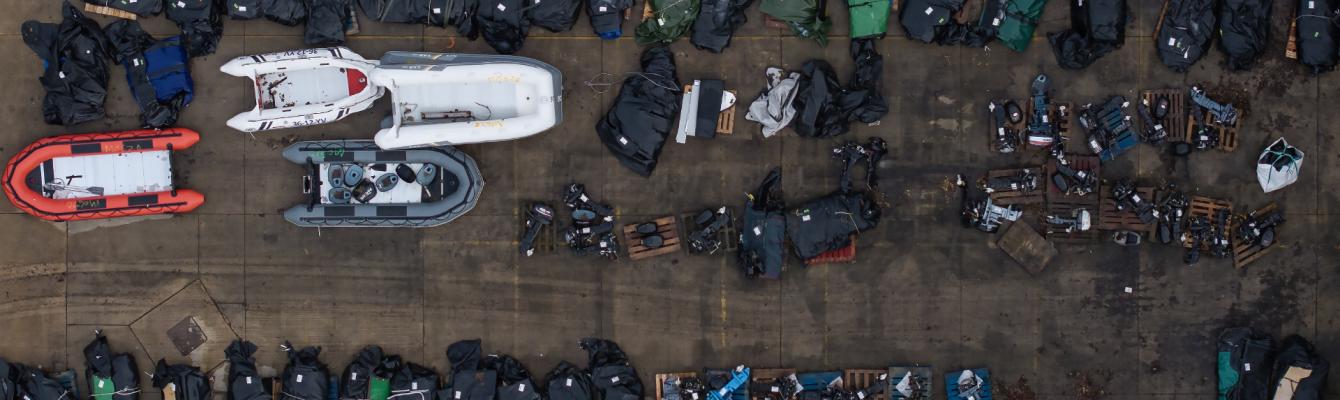 Small boats are stored in a Home Office facility