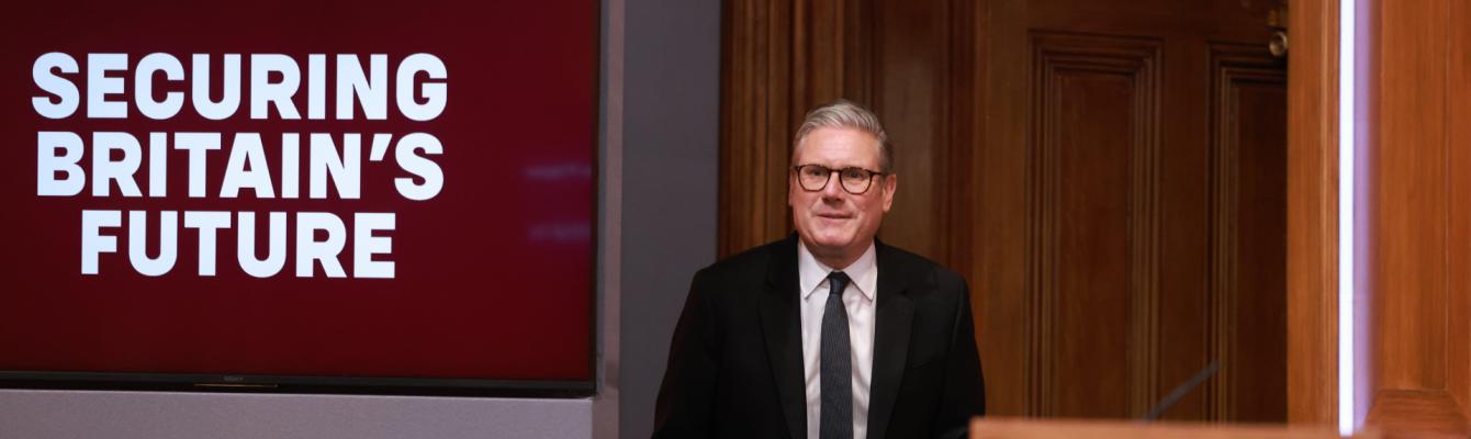 Keir Starmer arrives for a press conference on the Immigration White Paper in the Downing Street Briefing Room