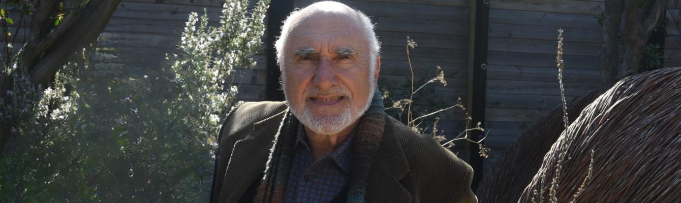 Older man smiling at camera