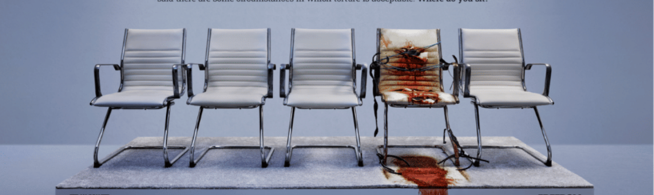 Image of five chairs in a row, in a clinical, bright setting. 1 of the chairs is covered in blood.