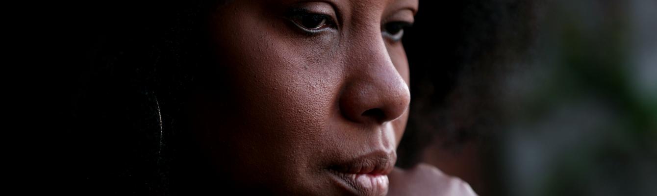 Image of woman looking pensive