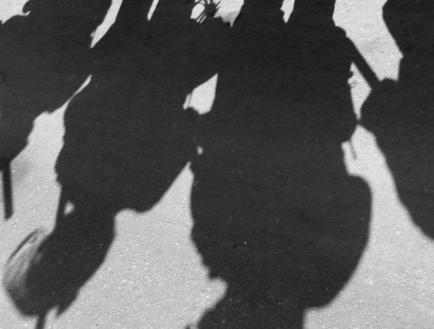 Shadows of policemen