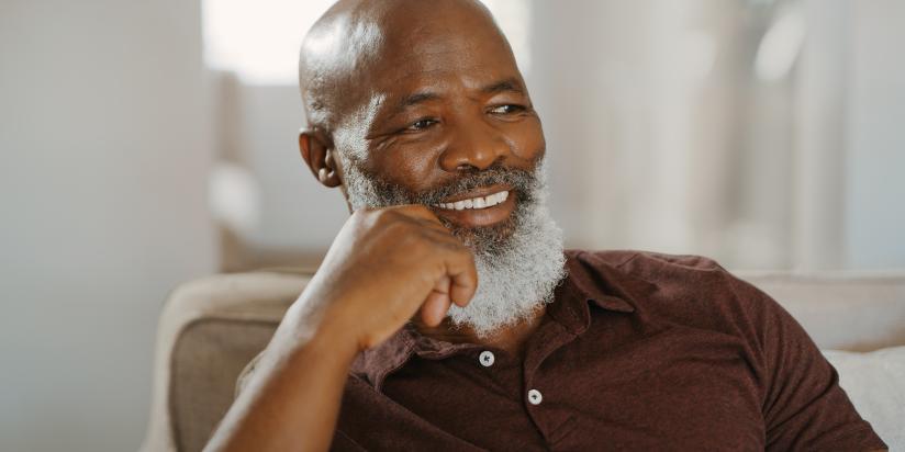 Older man with beard smiling