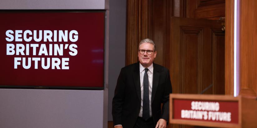 Keir Starmer arrives for a press conference on the Immigration White Paper in the Downing Street Briefing Room
