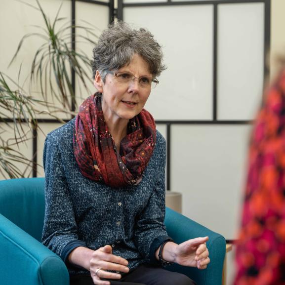 Woman sitting in a therapy session