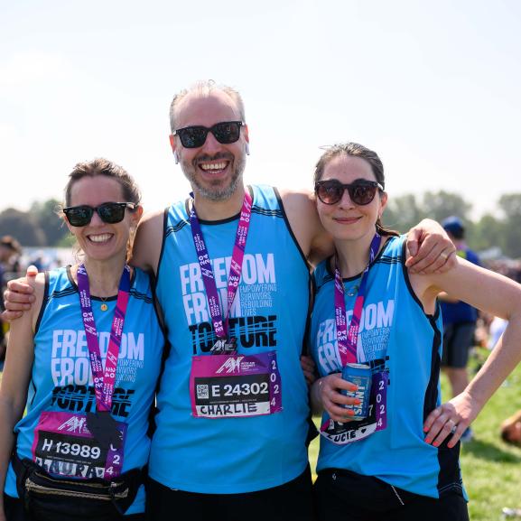 3 runners with their medals