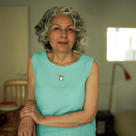 Middle aged woman smiling at camera