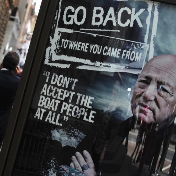 A poster promoting an Australian television documentary "Go back to where you came from"