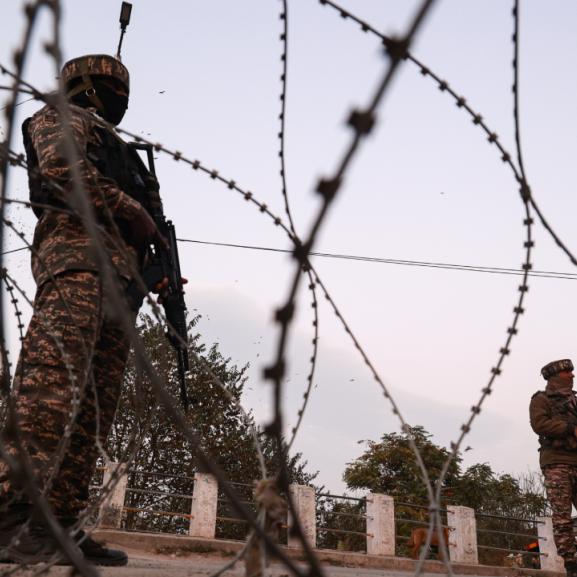 Barbed wire and soldiers