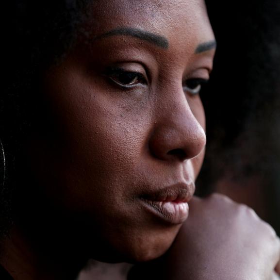 Image of woman looking pensive