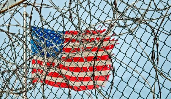 American flag and barbed wire