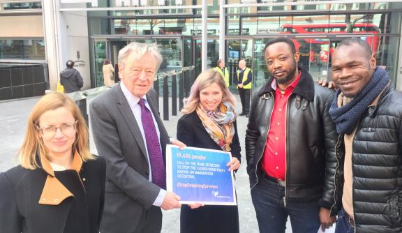 Sonya Sceats, Freedom from Torture Chief Executive, Lord Alf Dubs and members of the Survivors Speak OUT network.