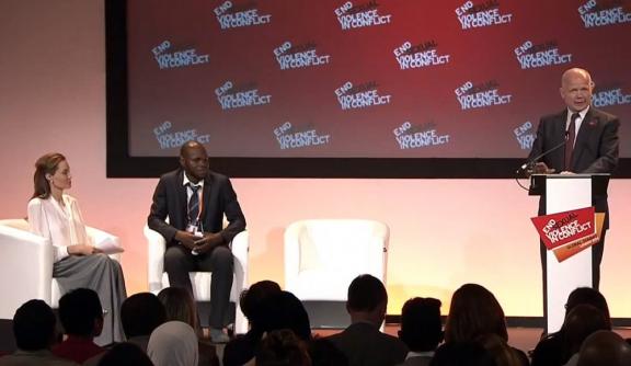 William Hague speaking with Angelina Jolie (left) and Kolbassia Haoussou (right)