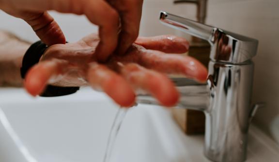 Man washing his hands