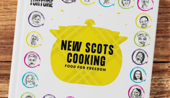 The colourful front cover of New Scots Cooking: Food for Freedom