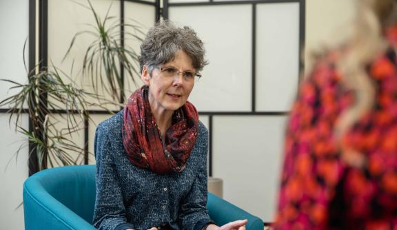 Woman sitting in a therapy session