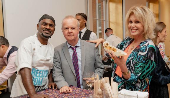 Joanna Lumley and Ian Hislop with Yogi, a torture survivor