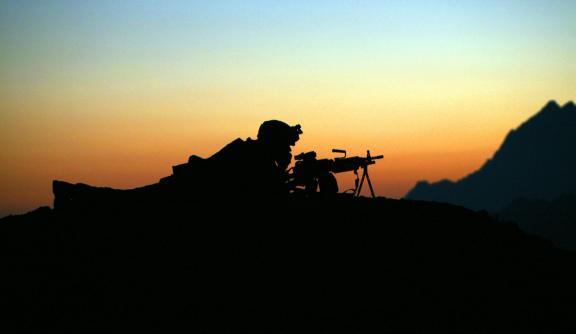 A Marine with automatic weapon in Afghanistan