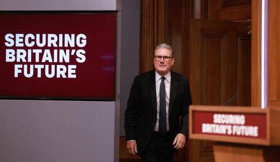 Keir Starmer arrives for a press conference on the Immigration White Paper in the Downing Street Briefing Room