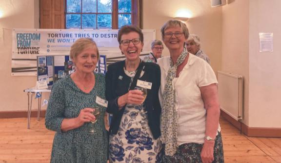 Three older women having a good time